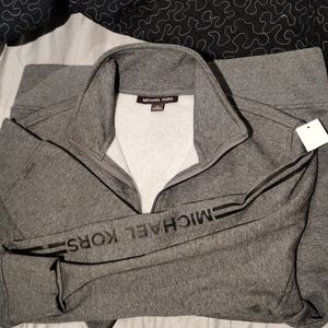 Michael kors 1/4 zipper dark grey sweater. Never worn
